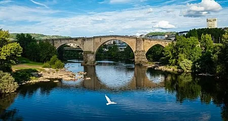 Roman Bridge Ponte Vella over the Miño River in Ourense._347